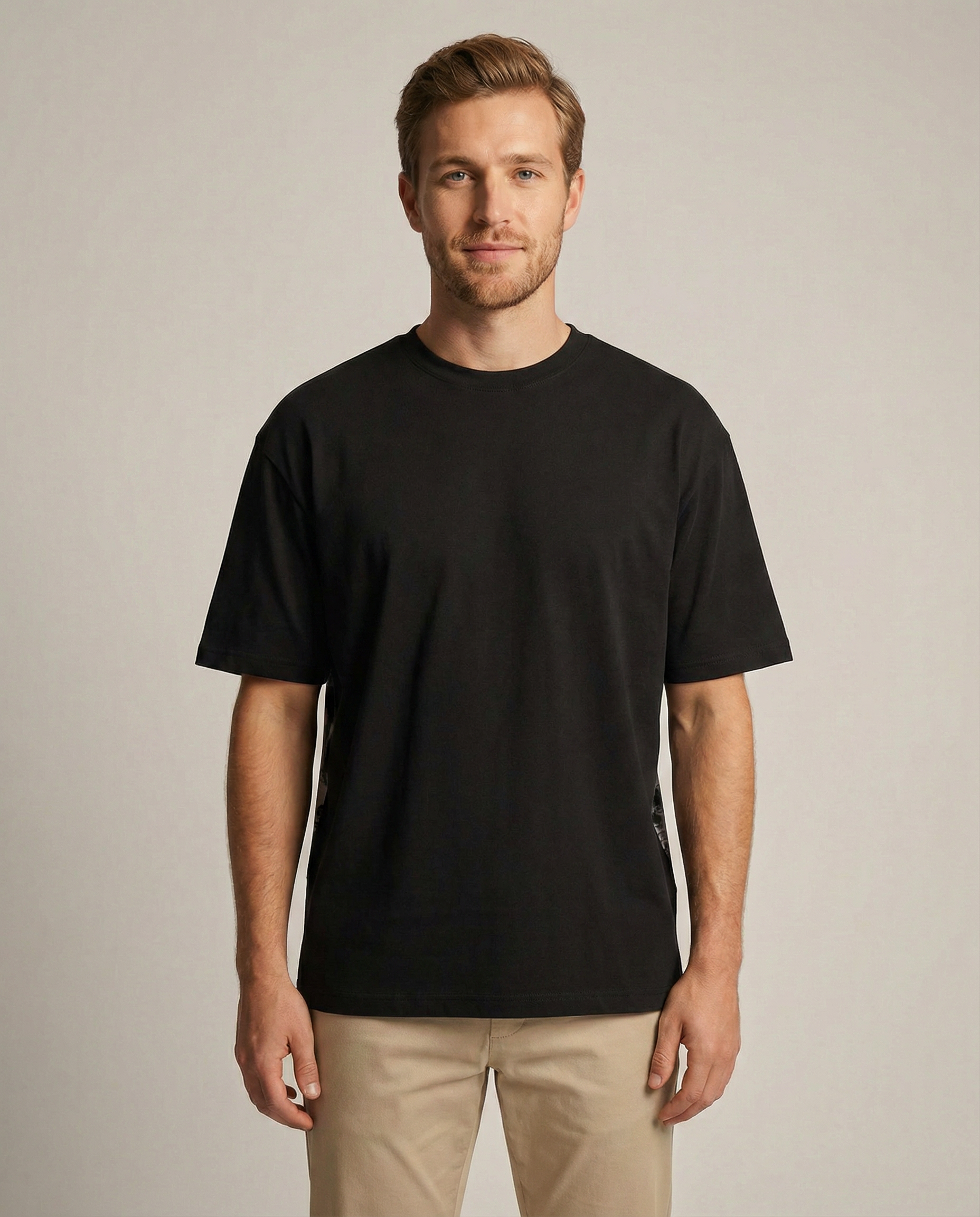 The Backprint Tee — Black front